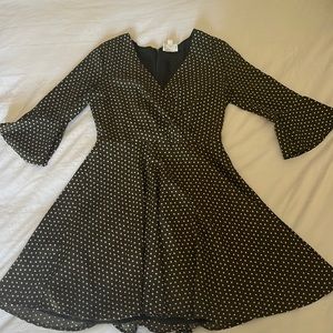 PRICE DROP: Everly Mini Skater dress in dark green with white polka dots